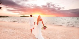 Couple on a beach at a destination wedding